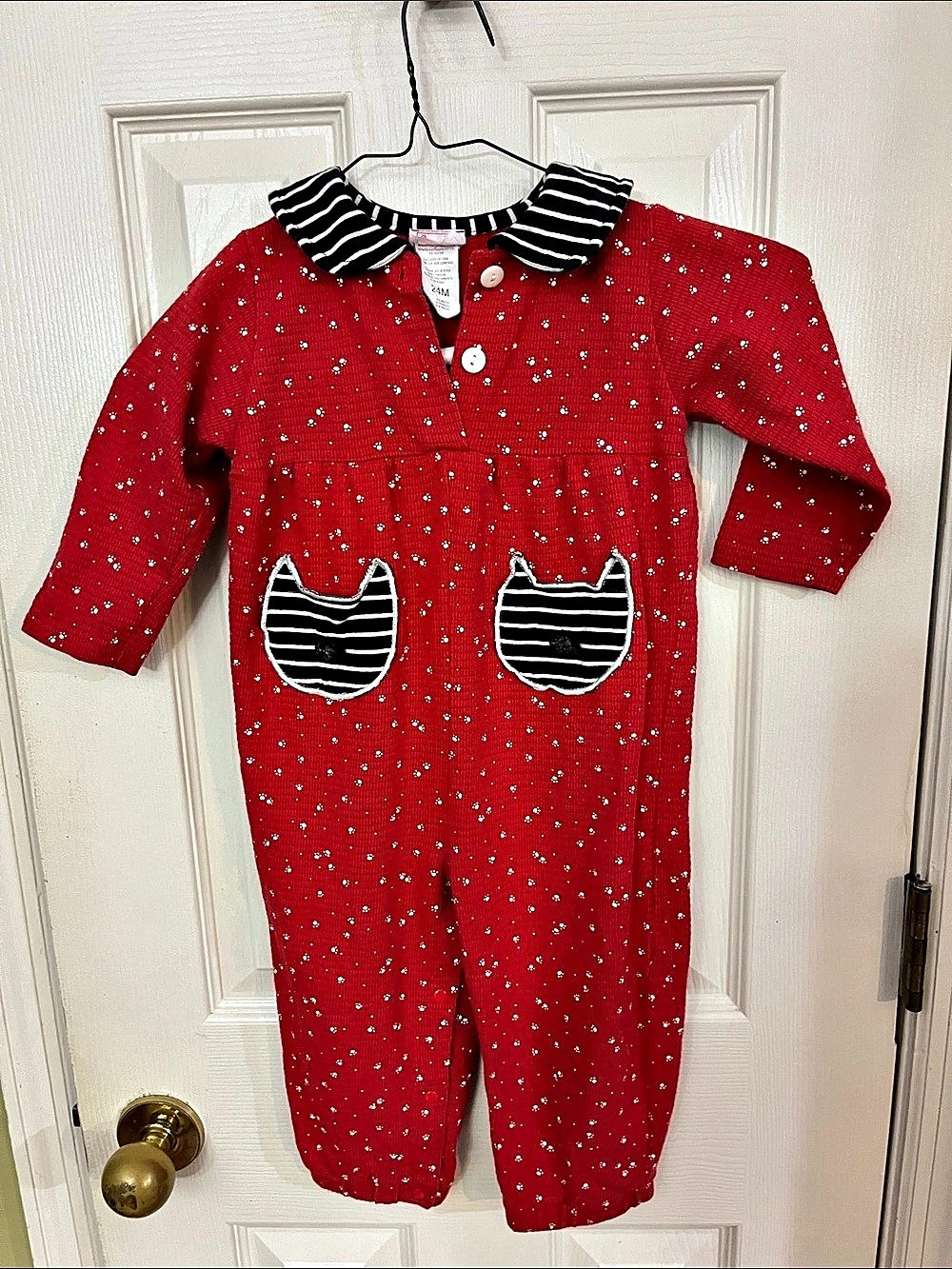 Buster Brown Vintage 1990 red romper with paw print design and cat pockets . Bab